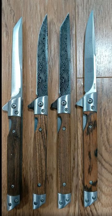 Ножі з чохлами нові