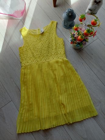 Żółta sukienka 134/140