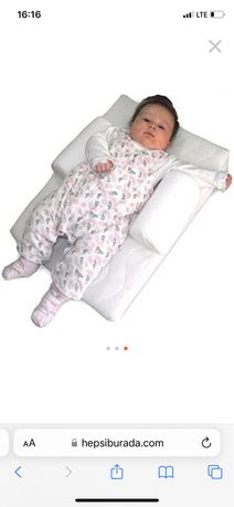 Рефлюксная подушка для новорожденного