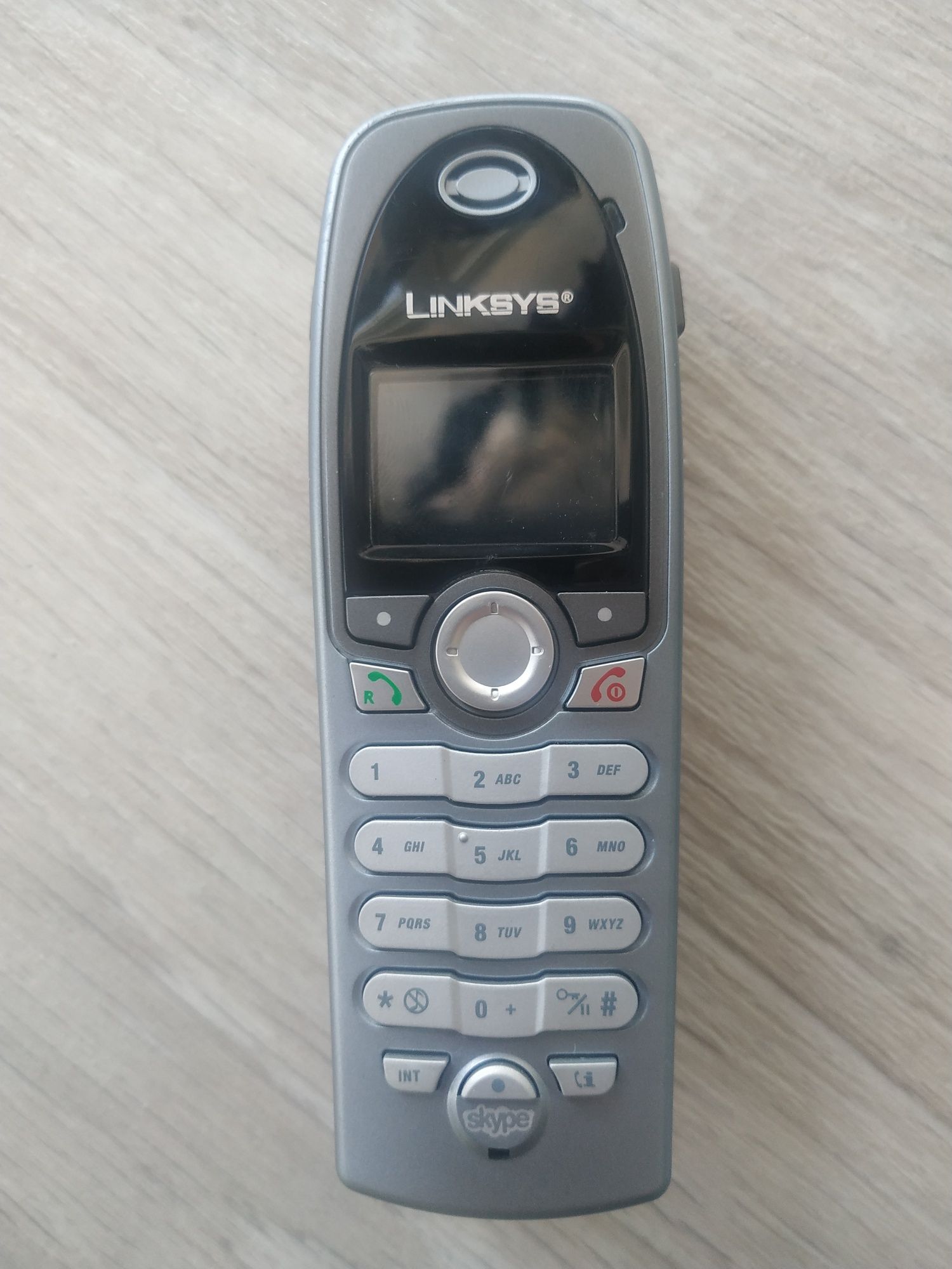 Телефон DECT Panasonic и дополнительная трубка Linksys