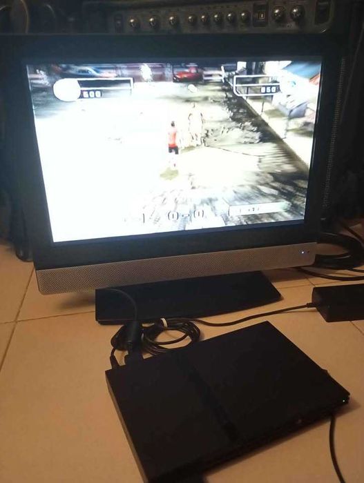 Ps2 Slim com fifa street e camara