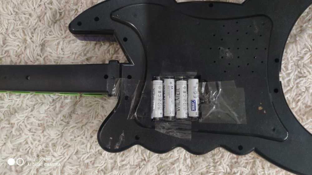 Детская музыкальная гитара