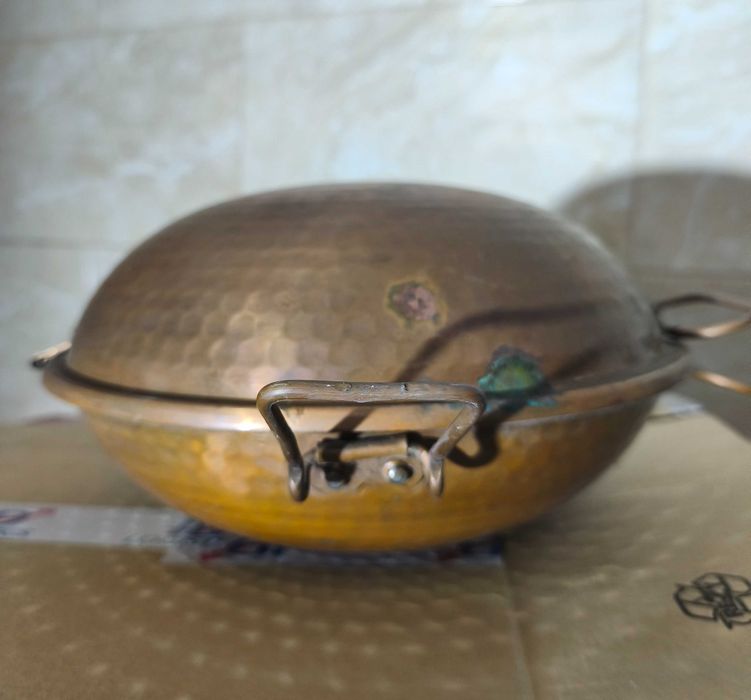 Peça de cozinha em cobre