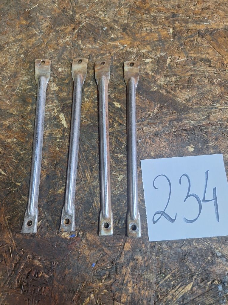 Uchwyty błotnika przód komar 19"