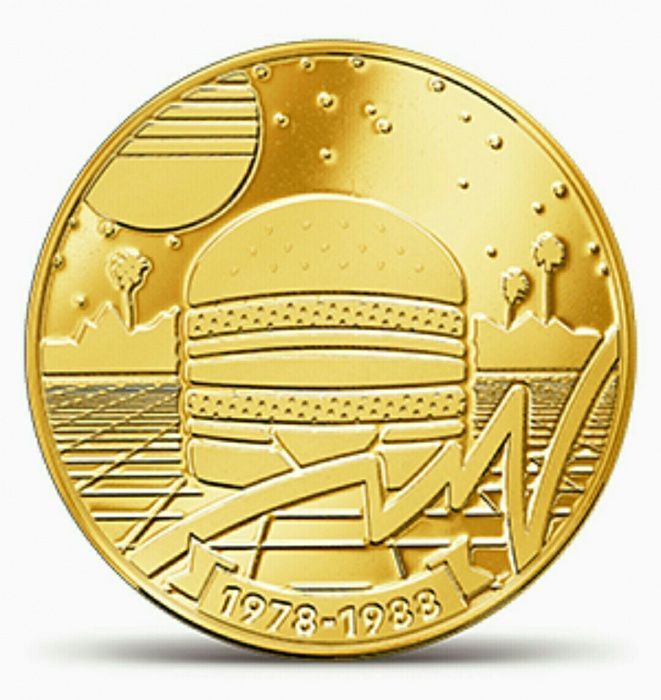 MacCoin. Одна из пяти колекционных монет. 50 лет БигМак. Монета.