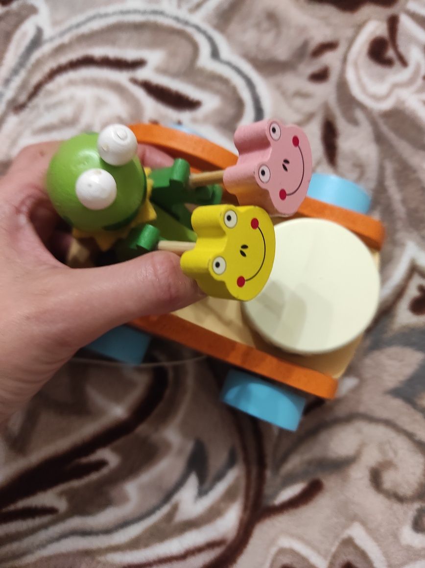 Игрушка каталка деревянная