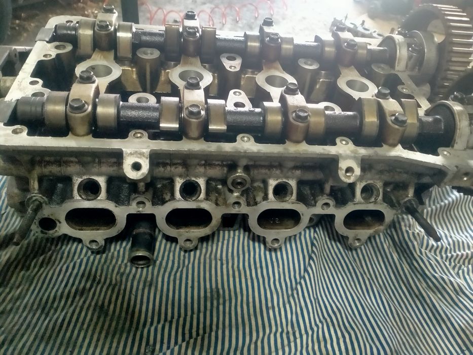 Головки блоку Ланос та Лачеті.