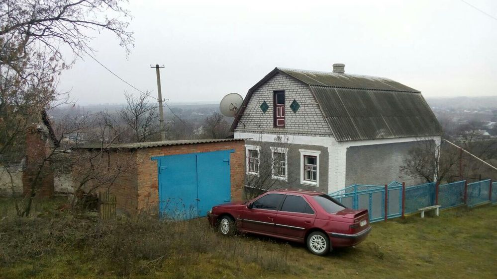 Будинок з гаражем торг