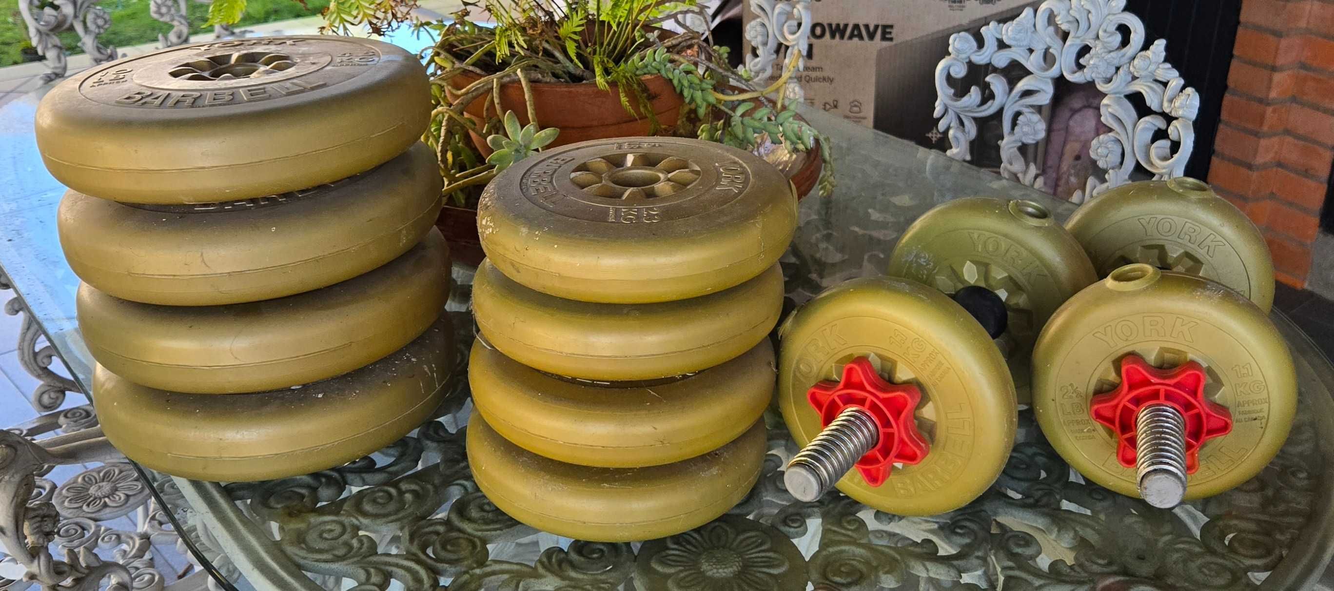 Vendo prancha e pesos de musculação
