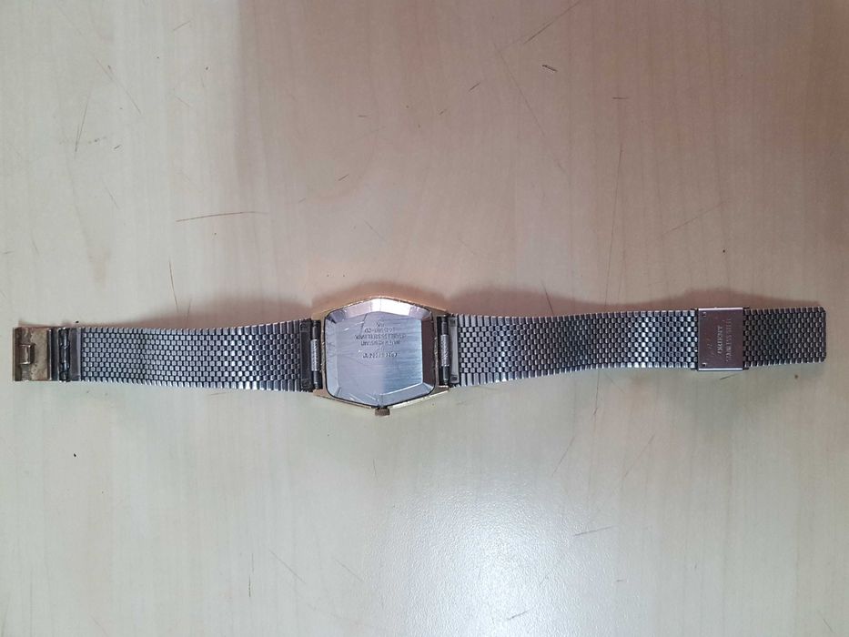 Zegarek nareczny ORIENT Quartz GP sprawny kolor zloty i czarny