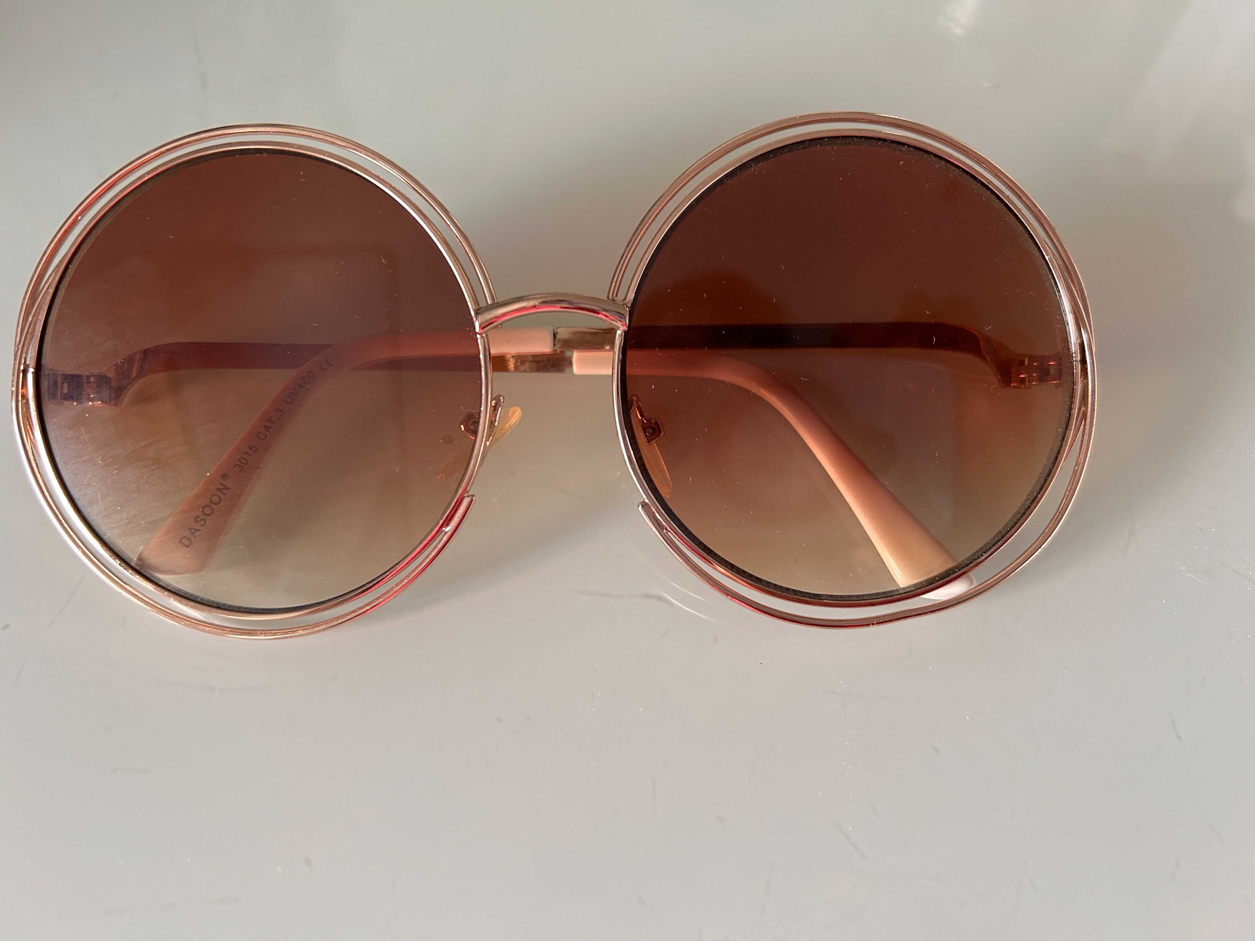 Oculos de sol com aros redondos