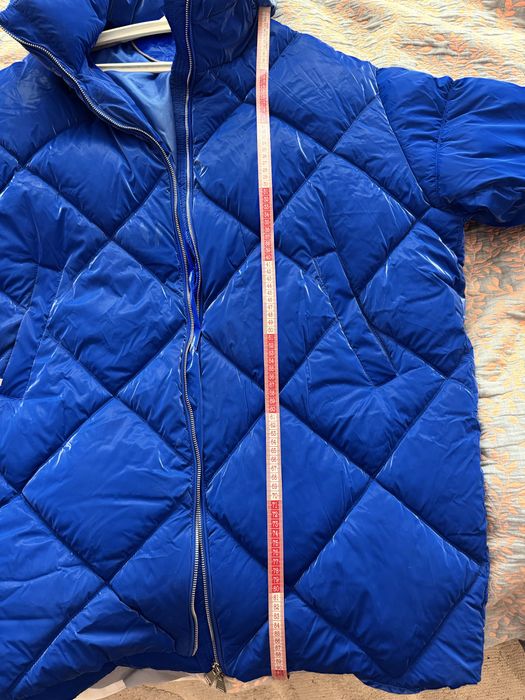 Подовжена зимова стьобана куртка пуховик