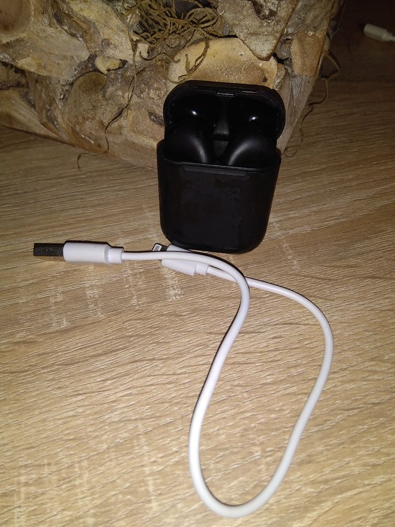Auriculares sem fios como novos