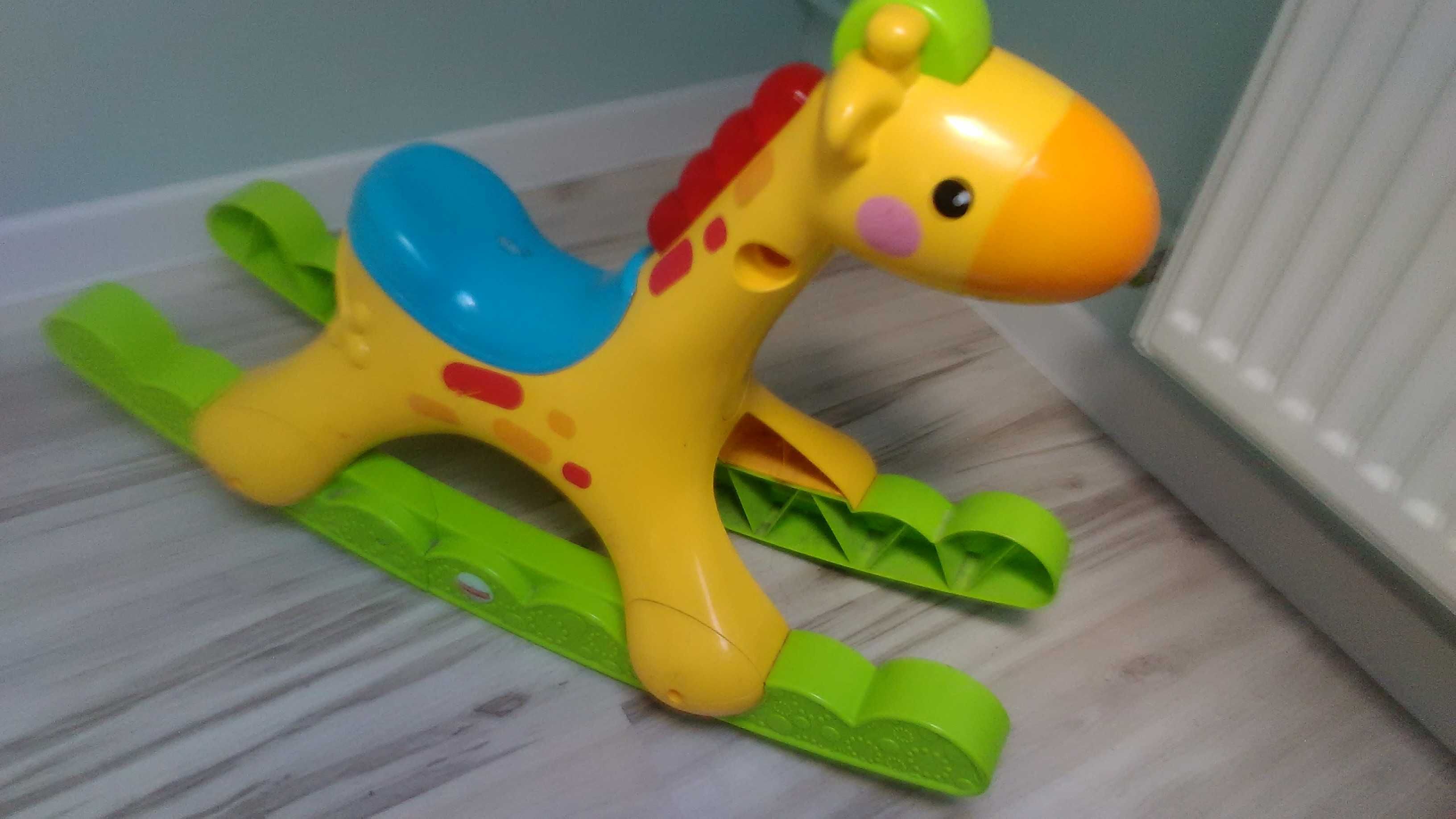 Konik na biegunach żyrafa bujana grająca fisher price