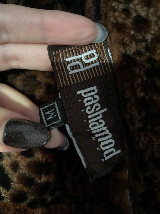 Натуральная дубленка с мехом енота