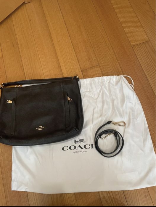 Mala coach nova com saco e alca