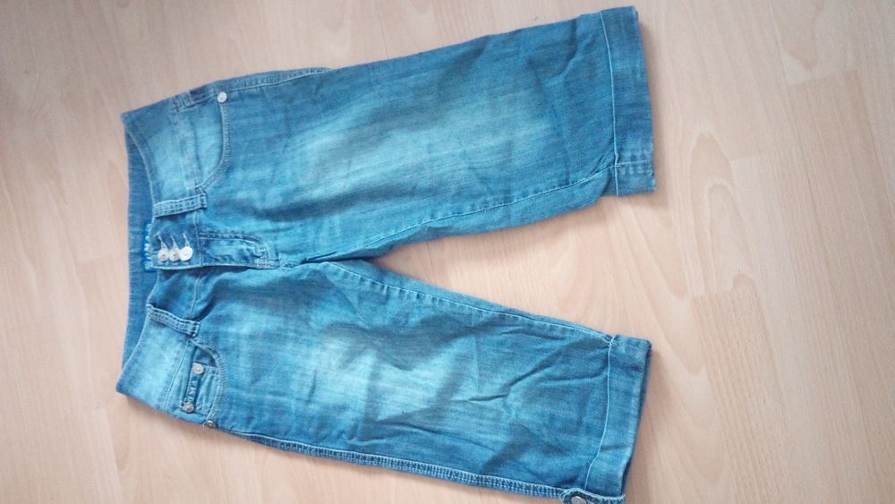 82. Spodnie męskie rybaczki rozmiar 28 firmy OMA