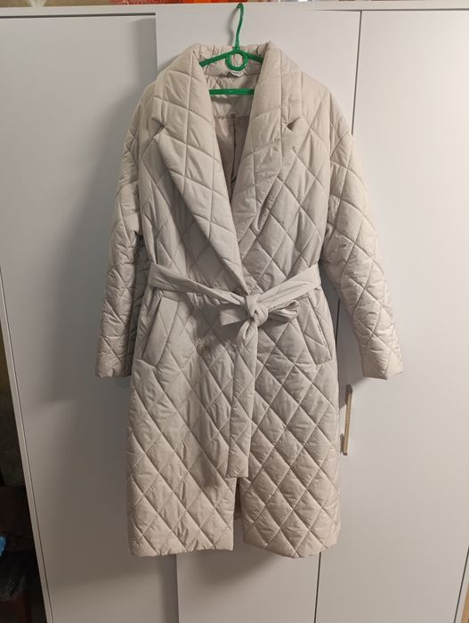 Нове пальто. Не підійшов розмір