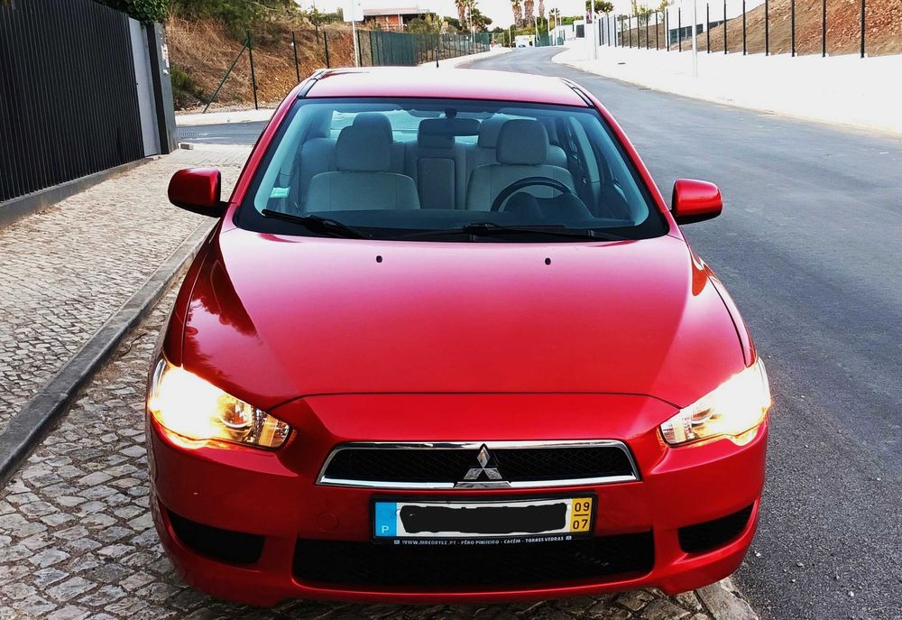 Mitsubishi Lancer 1.5 gasolina, 2009, só 121.800 Km. Excelente.