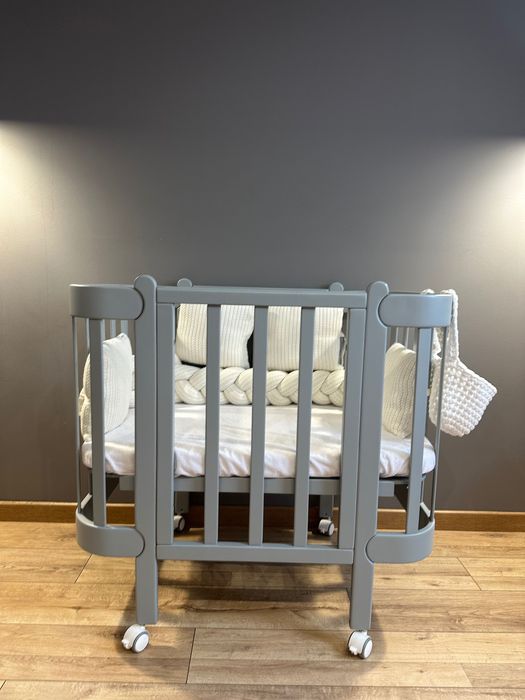 дитяче ліжко-трансформери з рухомою стінкою