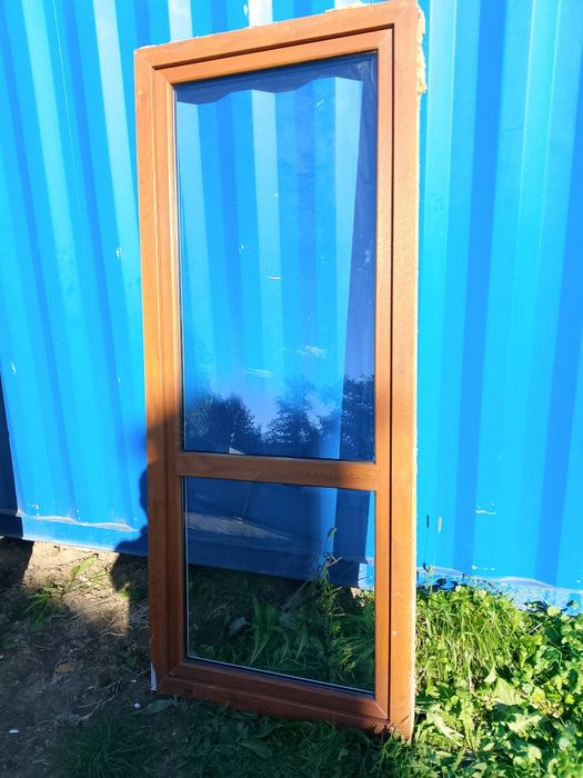 Okno balkonowe 90x216 złoty dąb rozwierne plastikowe