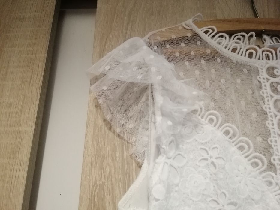 Koronkowa sukienka midi