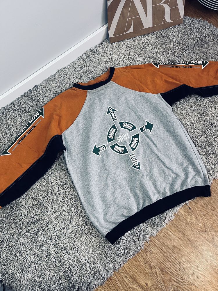 Bluza dziecieca 164 cm z nadrukiem napisy pomaranczowy rekaw szara cre
