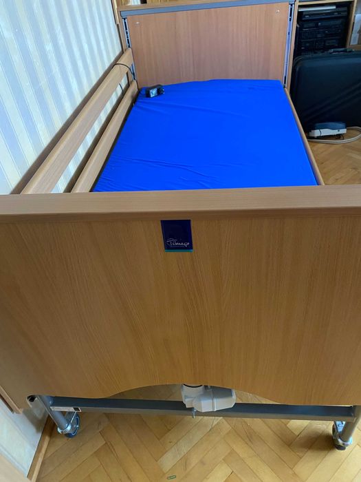 OKAZAJA Łóżko rehabilitacyjne elektryczne Timago z pilotem