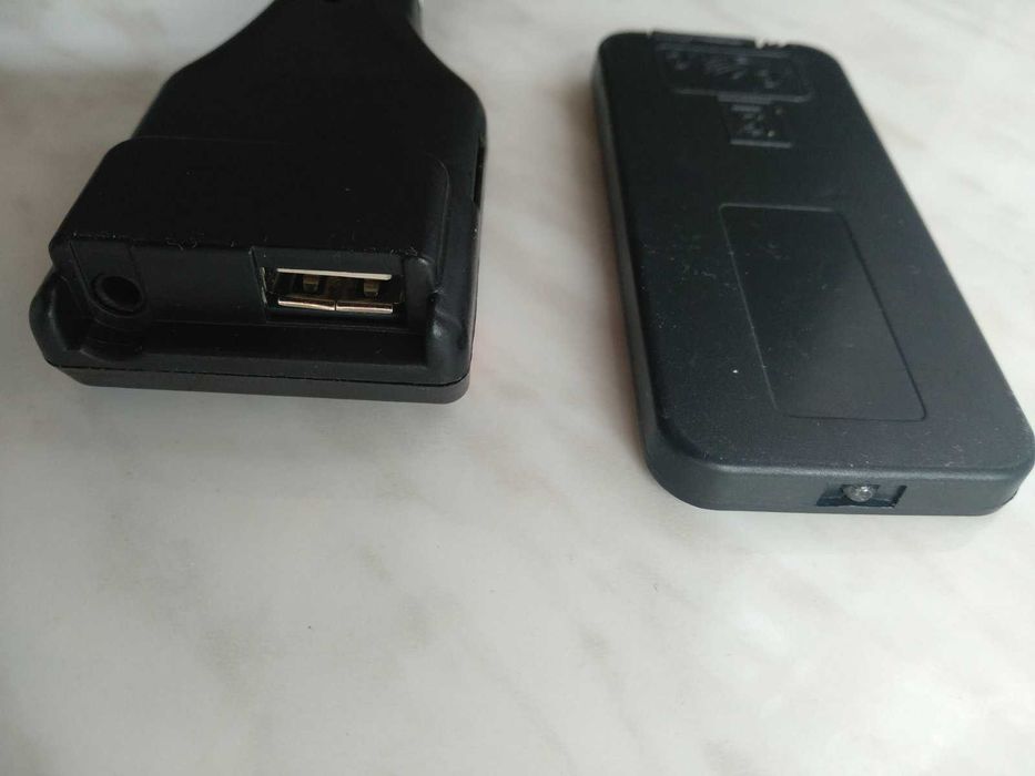 Продам FM-автомобильный адаптер с пультом