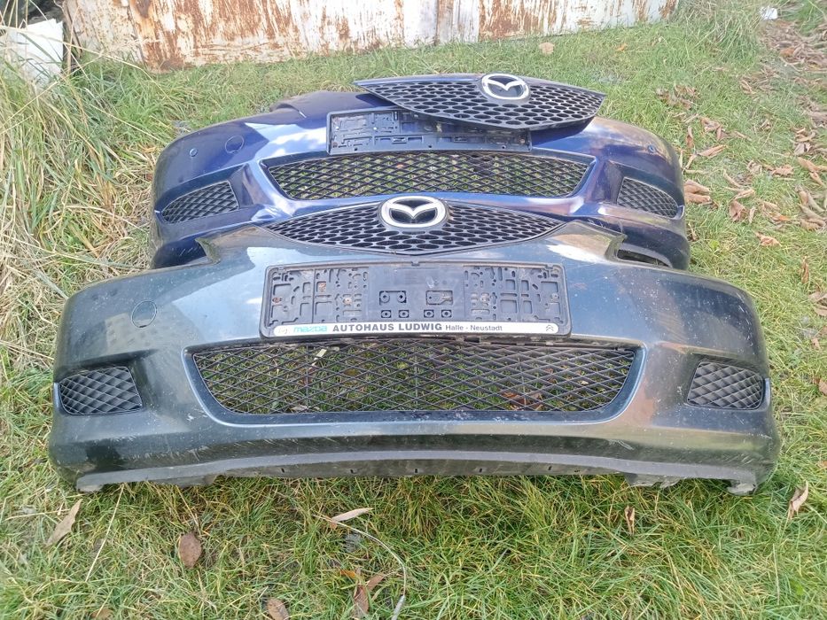 Передній бампер Мазда 3 БК седан хечбек бампер Mazda 3 Bk седан хетчбе