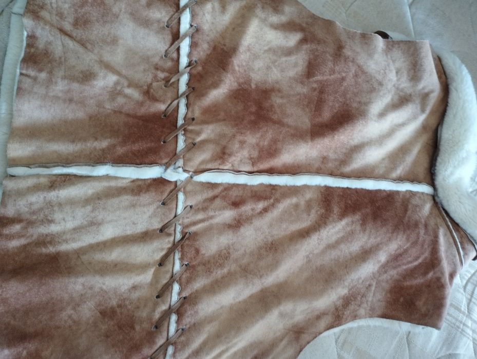 Colete de pele com pêlo dentro