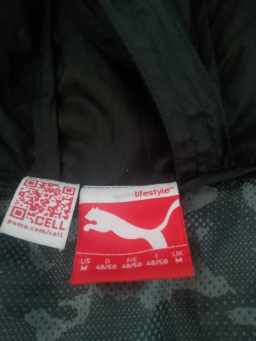 Пуховик фирма Puma.