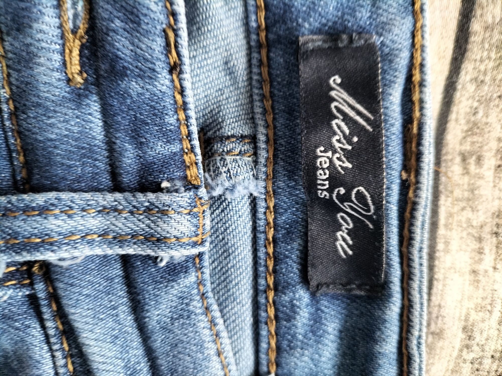 Jeansy skinny 38