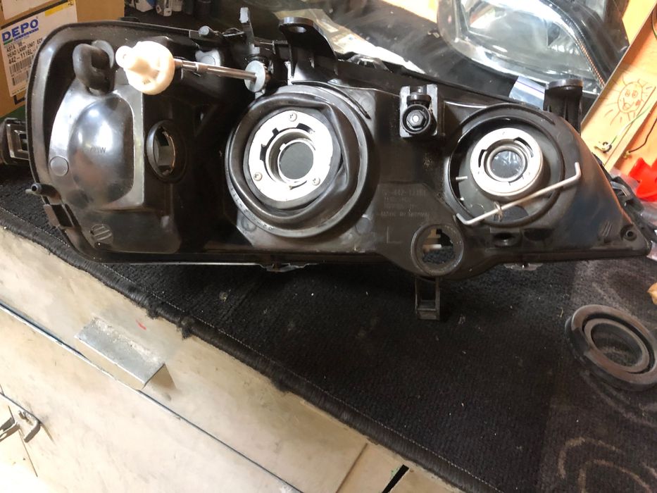 Фара левая Опель Астра G