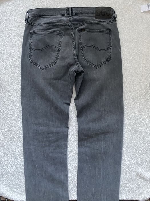 Сірі джинси Lee.