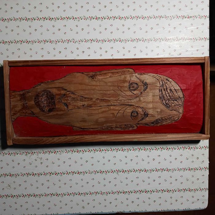 Płaskorzeźba mężczyzna tubylec