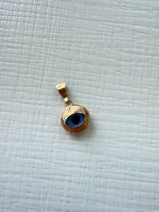 Золотой кулон «от сглаза»
