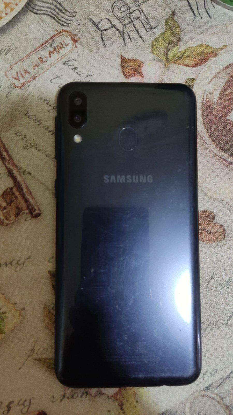 Телефон Samsung M 20