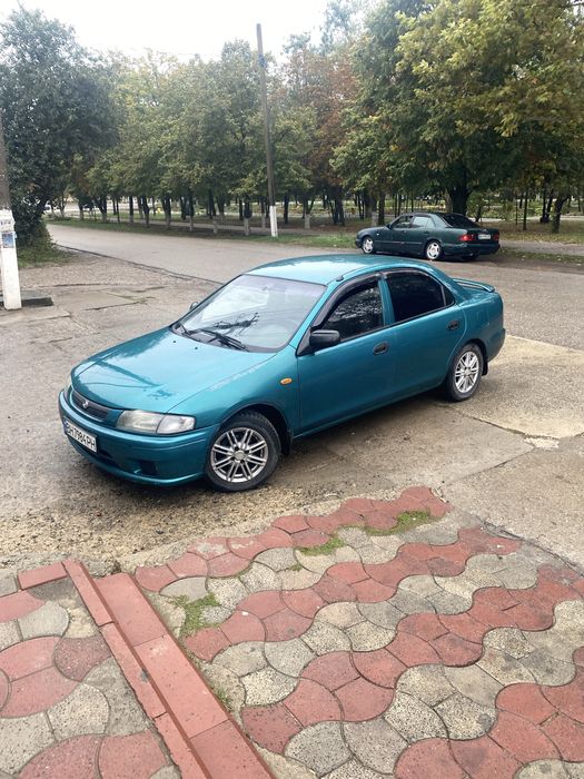 Мазда 323/ 1.5/акпп/1998