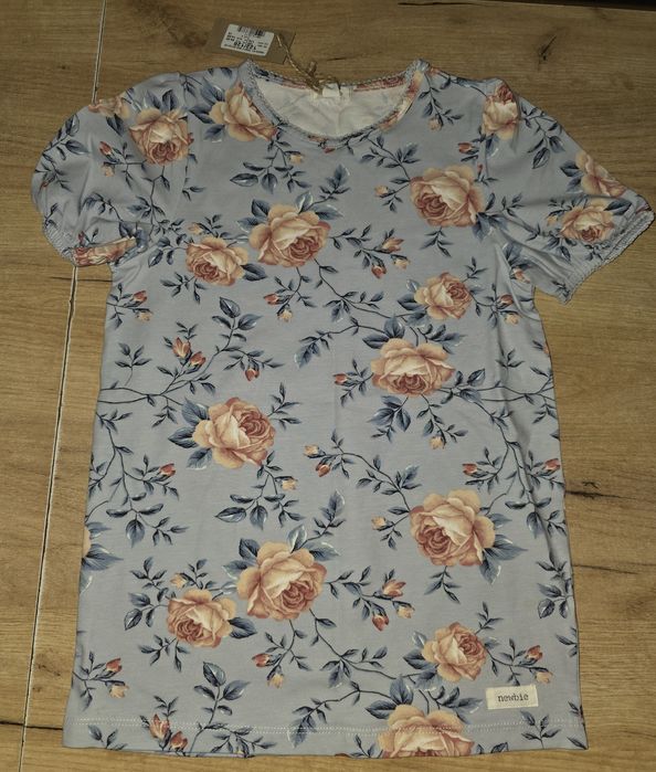 Nowa bluzeczka Newbie piekny wzór 122/128