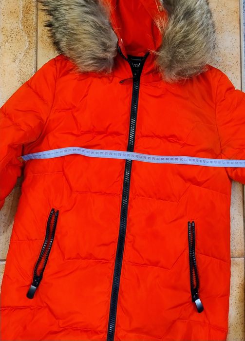 Продам пуховик теплий