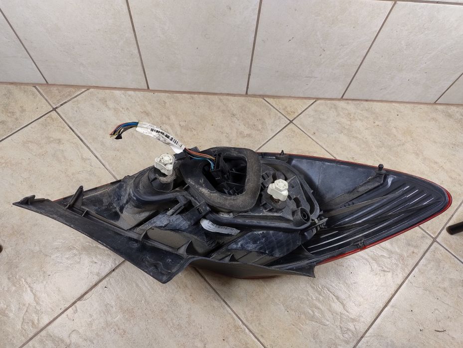 Opel Corsa D lampa prawy tył 5D Europa 06-14 wysyłka OLX wkład lampy