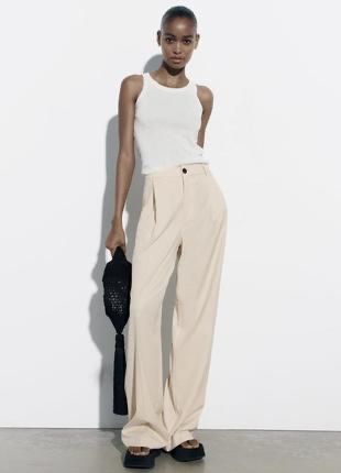 Штани білі кльошні zara