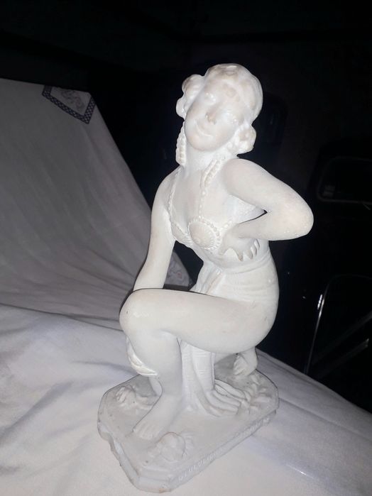 Estatueta antiga em pedra