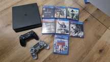 PS4 + 2 pady i 7 gier