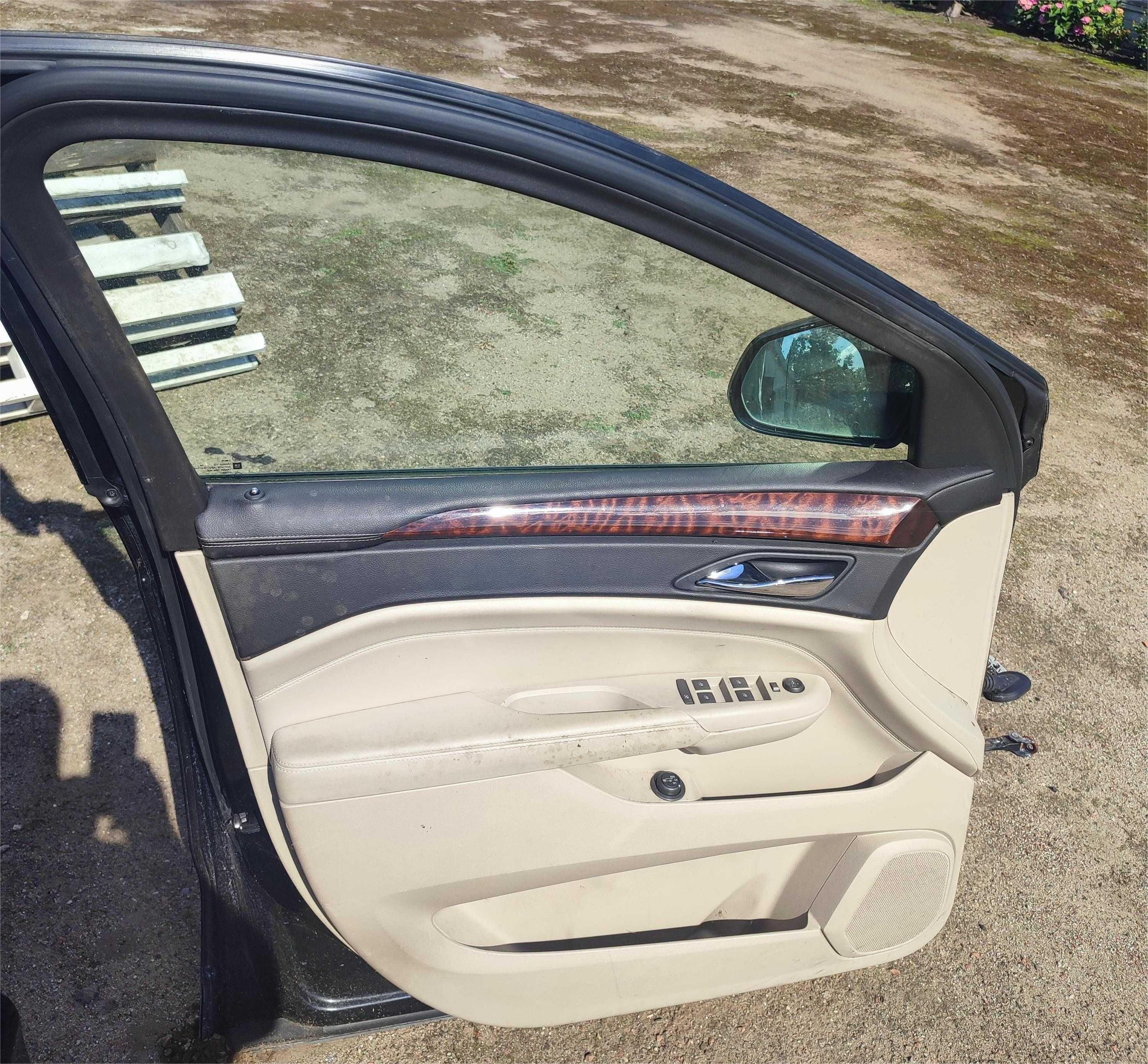 Cadillac SRX drzwi przednie lewe kompletne 2010-16
