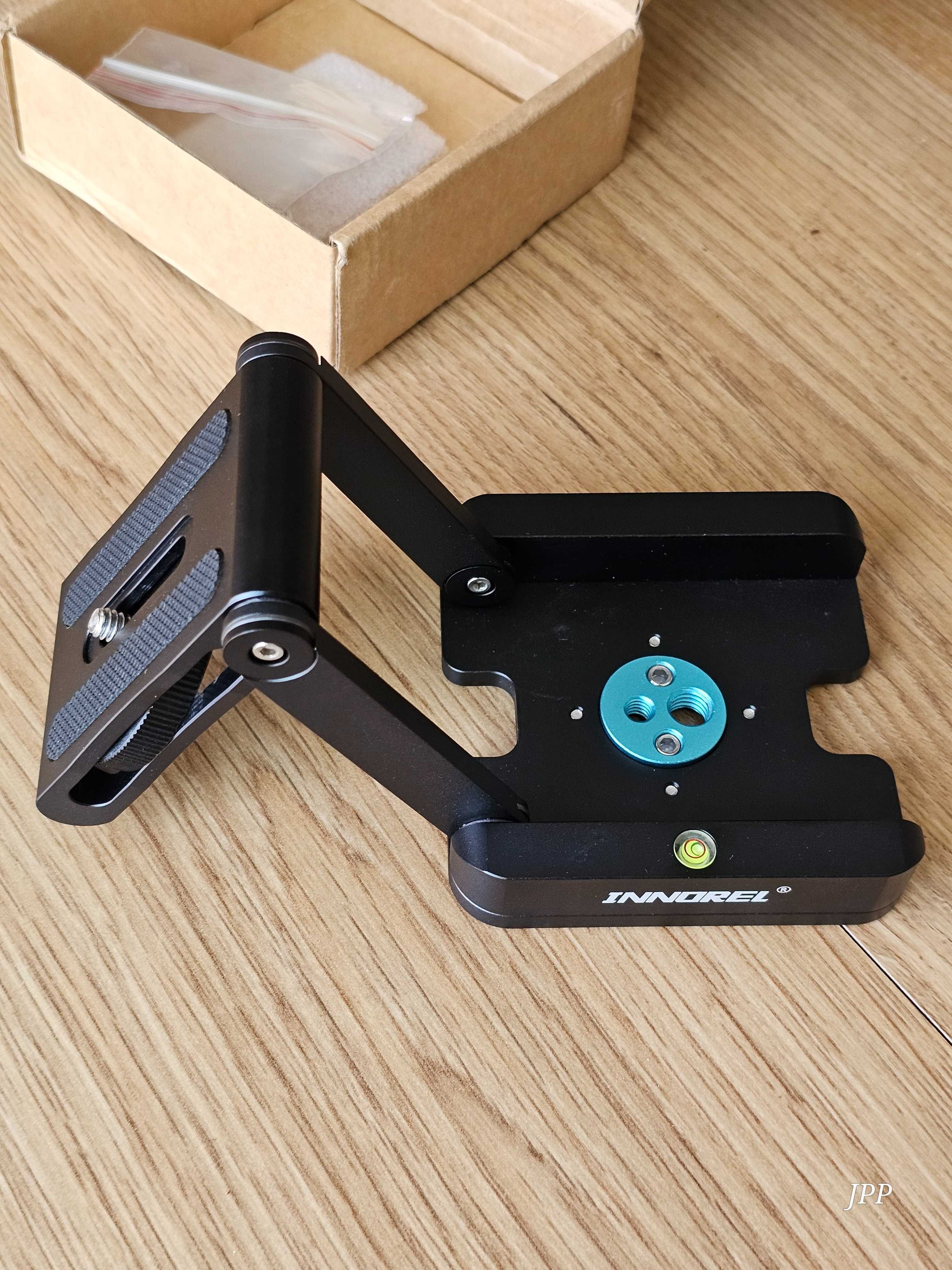 Base articulável com bolha de nível para máquina fotográfica/vídeo