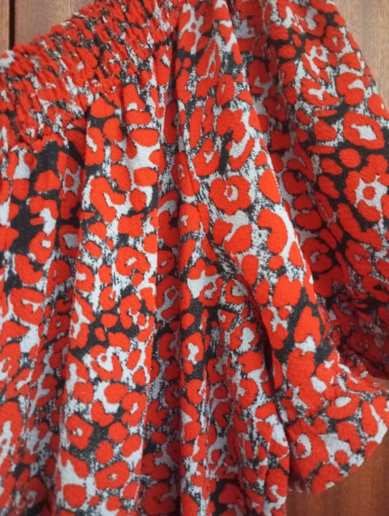 Macacão em tom vermelho