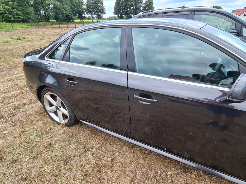 2szt LISTWY SLINE progowe LEWA +PRAWA Audi A4 B8 2009r LZ7L