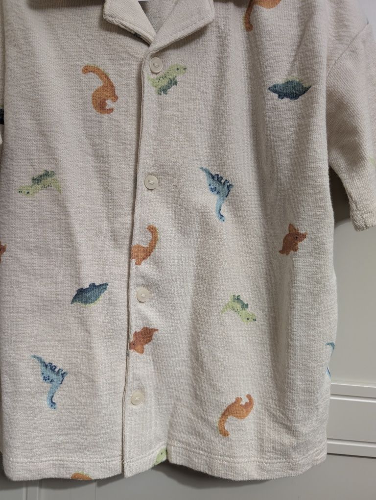 Cudny komplet H&M 104 kremowy dinozaury